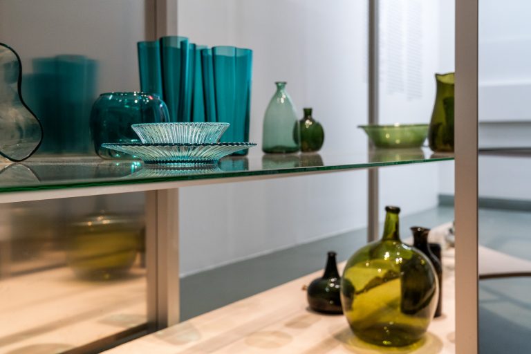 Glassware on a shelf at Iittala.