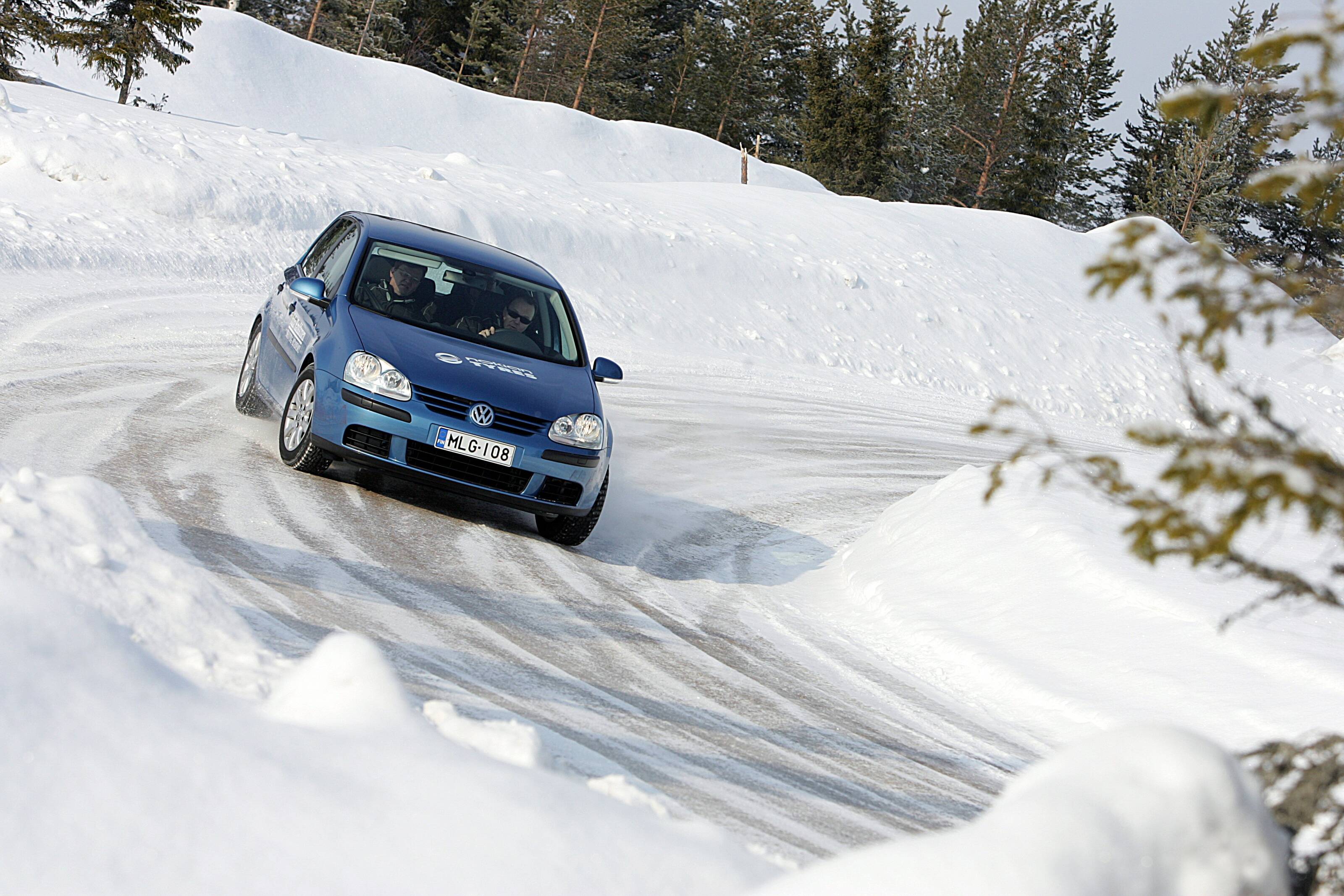 Rally car driving on an icy track