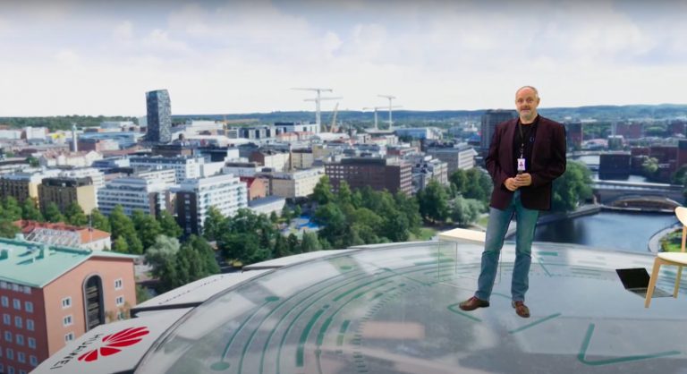 Atanas Gotchev standing on top of a building at Tampere University.