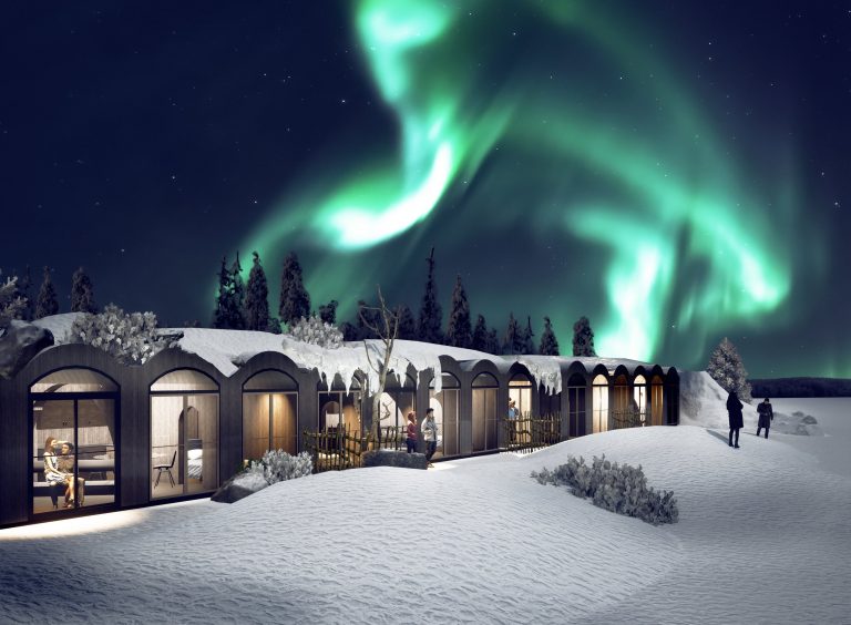 The Northern Lights over the snow-covered Apukka Resort.