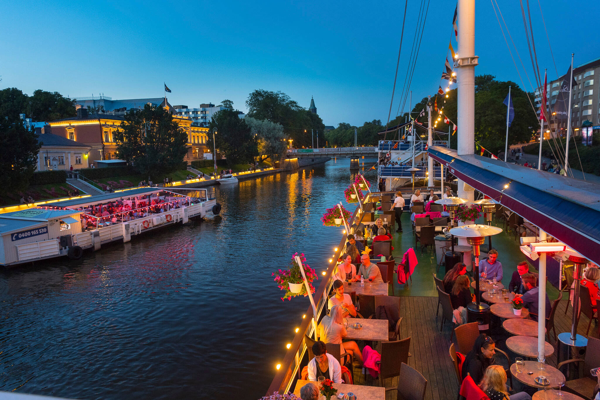 Restaurant boats by the Aura River in Turku, Finland
