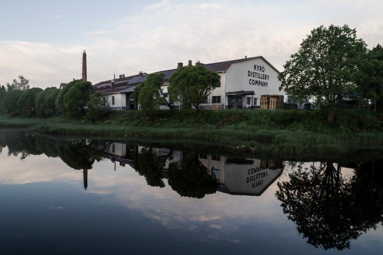 The river and the Kyrö Distillery building. 