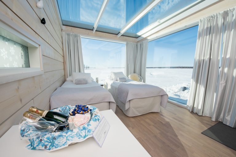 The inside of a room at the Seaside Glass Villas.